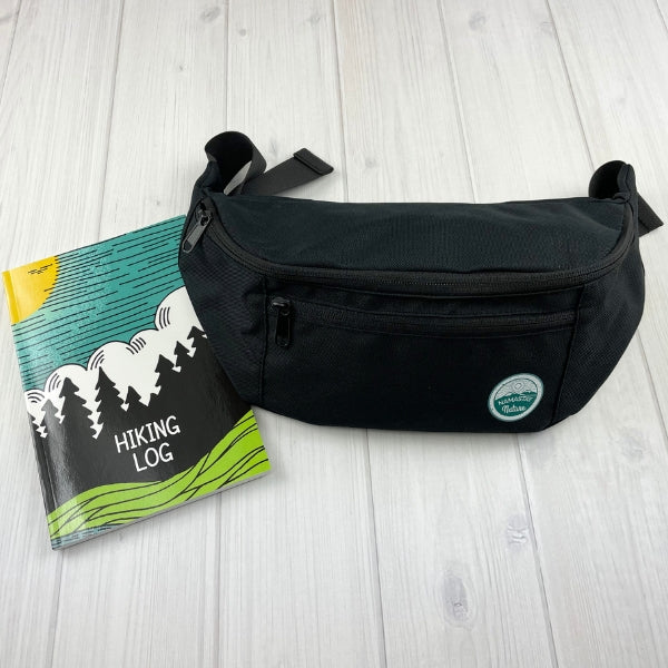 black fanny pack with kids hiking log