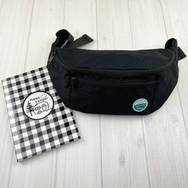 black fanny pack with happy camper RV planner journal