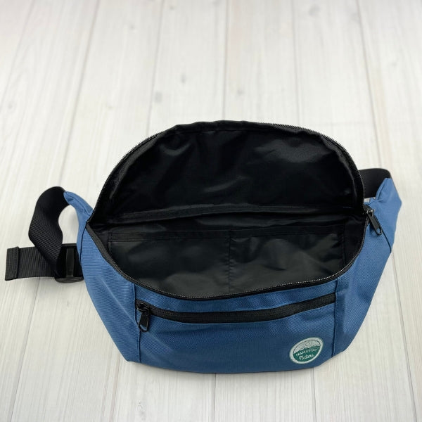 light blue fanny pack showing 2 inside compartments