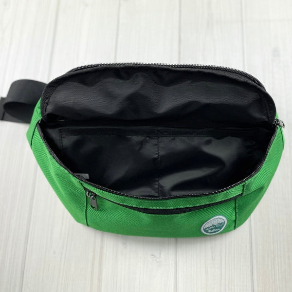 Kelly green fanny pack showing inside compartments