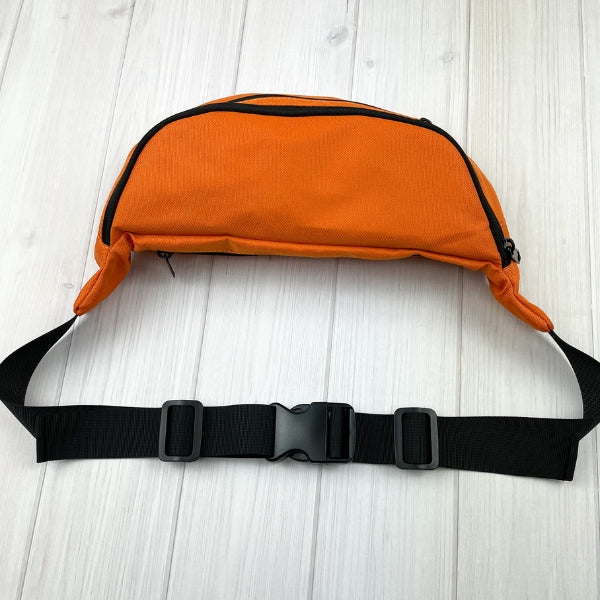 orange fanny pack showing the belt